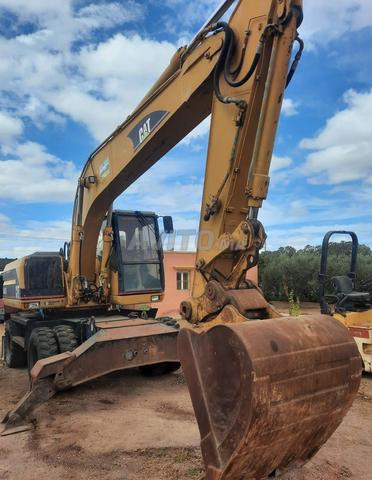 Poclan catrbillar M315 diwana jdida 2025 - 2