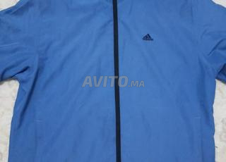 جاكيت Adidas أزرق أصلي بحالة جيدة جدا