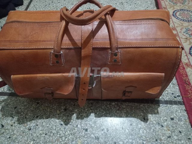 حقيبة جلدية 🐫 جمل