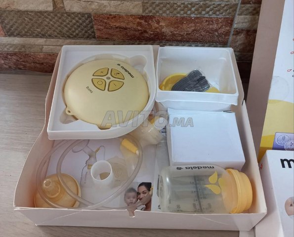 رضاعة حليب كهربائية ميديلا