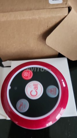 نظام استدعاء بزر مع مستقبل ساعة