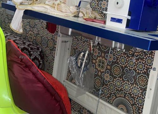 Machine à coudre automatiq