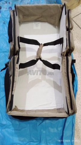 حقيبة وحامل أطفال