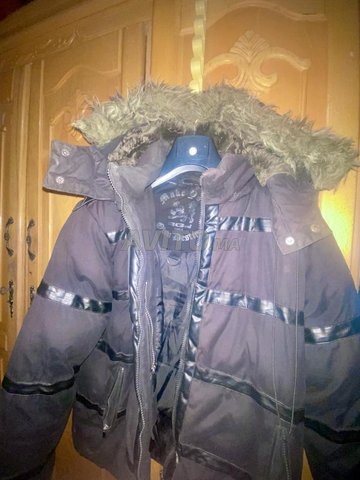 معطف بحالة جيدة جدا