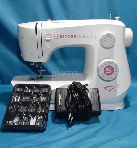 ماكينة خياطة سنجر مع 16 ملحق