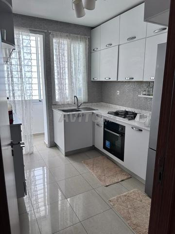 Joli appartement meublé avec piscine - image 4