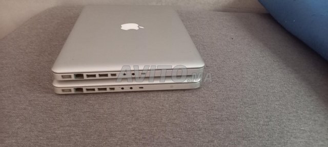 جهازان كمبيوتر محمول ماك بوك في حالة ممتازة