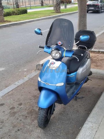 Scooter vespa city 2021 4temp excellent état