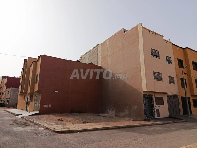 Terrain 2 façades tiré 87m centre ville.