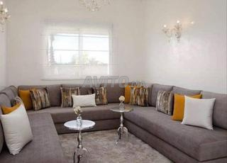 Salon moderne en U – Luxe, confort et élégance