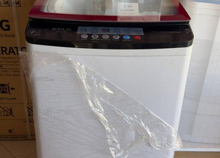 غسالة ملابس أوتوماتيكية