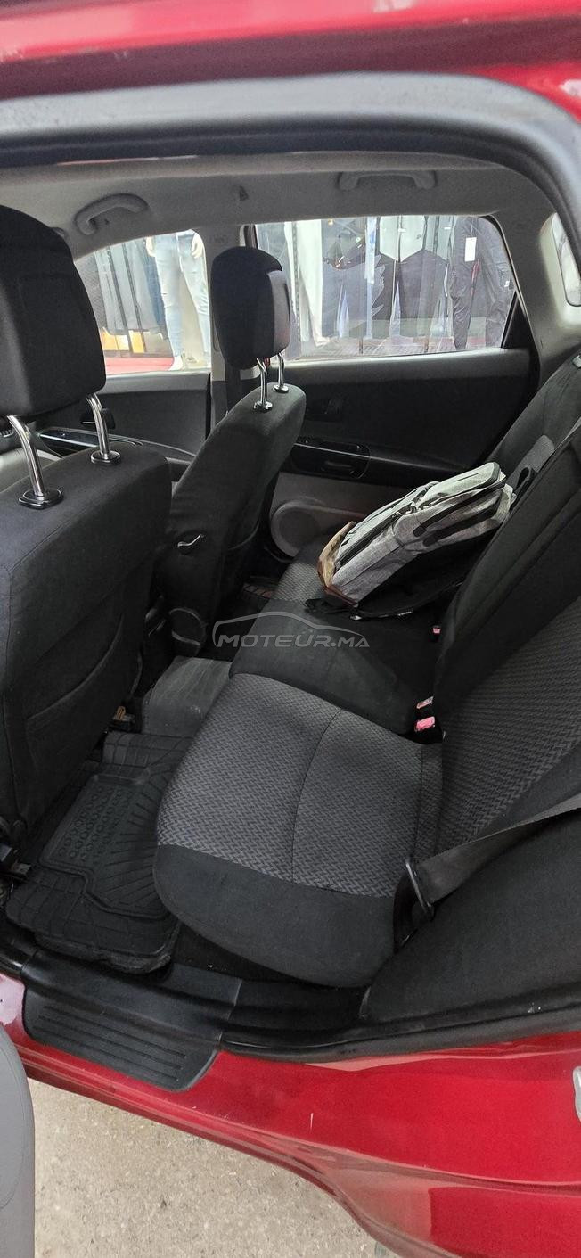 Kia Ceed 2010 avec des housses originales