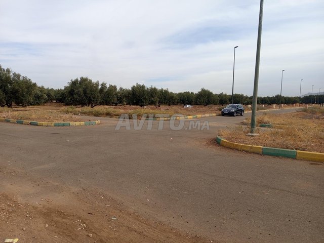 بقعة فيلا للبيع ببني ملال المساحة 313 3وجهات