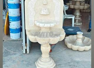 نافورة جدارية من الرخام مع مضخة صغيرة