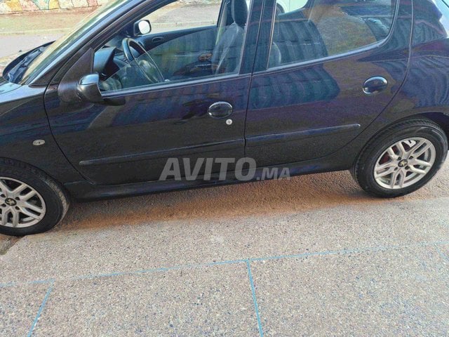 Peugeot 206 plus essence