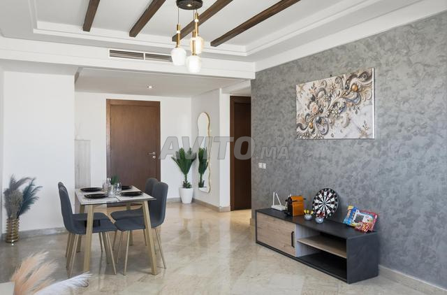 Appartement moderne avec piscine et salle de sport (sport)