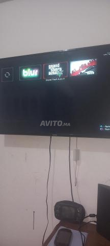 PS3 avec 3 manettes et 6 jeux installés et jeu CD - 2