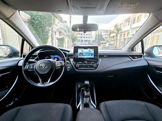 toyota corolla hybride premiere main tres bon état