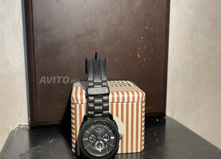 ساعة فوسيل أصلية