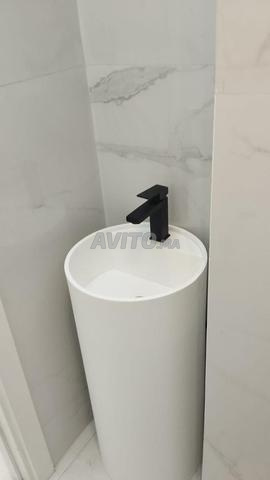 Vasques de salle de bain en Corian