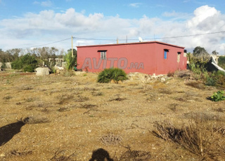 Petite ferme à vendre sur goudron