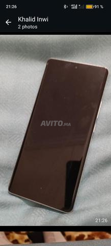 realme gt6 avec chargeur et 5 pochette - 2