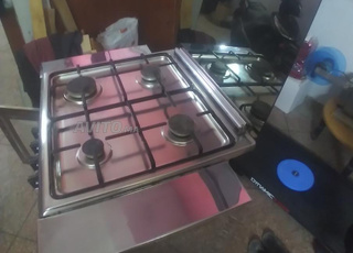 Four en inox de la société, encore neuf