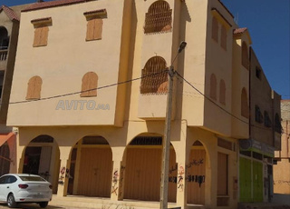 Immeuble (Sous-sol /MAGAZIN/2ETAGES)