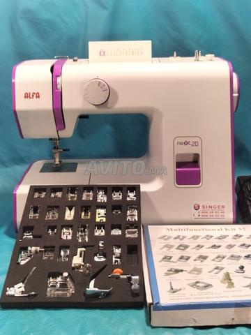 ماكينة خياطة مع طقم 32 قطعة إكسسوار