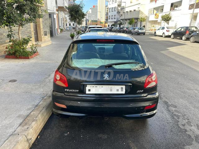 بيجو 206 بلس بنزين