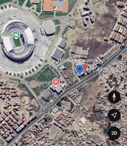 أرض للبيع على الشارع الرئيسي مسنانة جنب ملعب طنجة