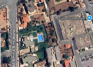 بقعة أرض لبناء عمارة مسجلة 1100م R2 تجارية