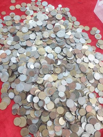 100 كيلو غرام من العملات