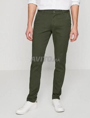 بنطلون KOTON أصلي لون زيتي مقاس 38