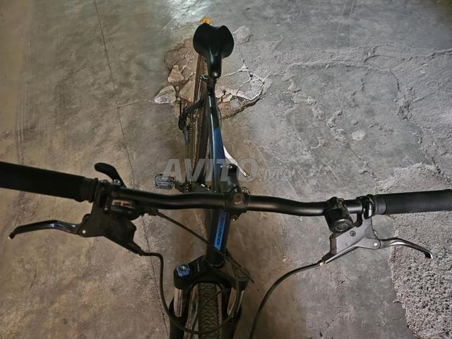 Vélo Rockrider avec 2 freins hydrauliques