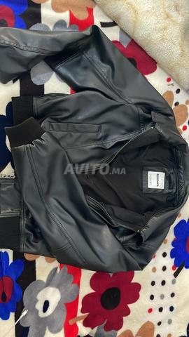 جاكيت جلد أسود جديد