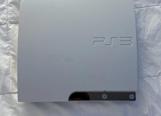 PS3 slim gris