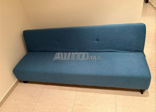 2 canapés-lits bleus de chez KITEA en bon état