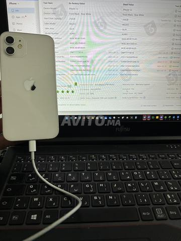 iPhone 12 - 256 Go - أبيض - حالة ممتازة