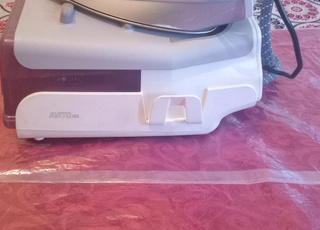 Fer à repasser à vapeur