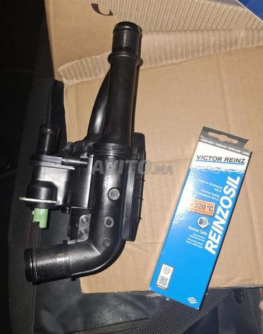 Thermostat neuve ford focus 3 avec colle