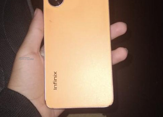 Infinix hot 30i encore neuf couleur orange