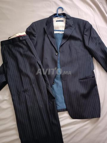 بدلة تومي هيلفيغر مقاس 48 يورو