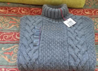 Tricot col roulé original de marque neuf XL