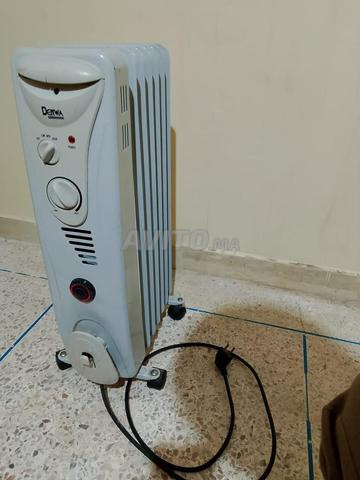 مدفأة زيتية كهرائية (سخان، Chauffage)