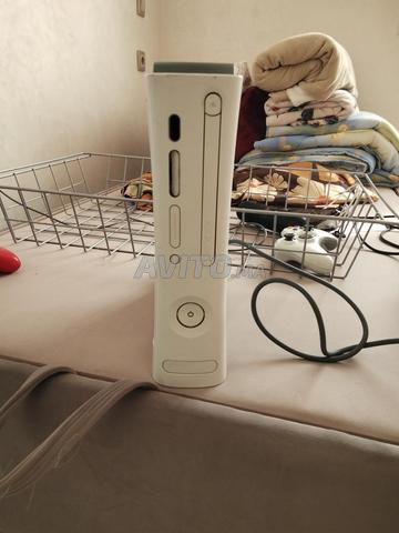 Xbox 360 elite original plus38 jeux avec 2 manette