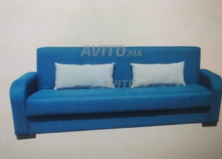 Canapé-lit avec rangement accoudoirs