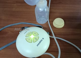 tire lait medela swing