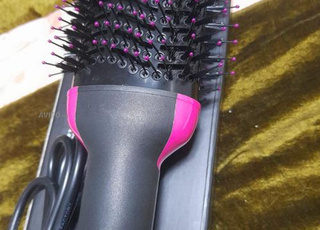 Peigne sèche-cheveux à vendre, encore neuf