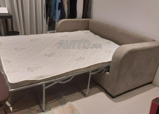 Canapé lit en bon état à vendre